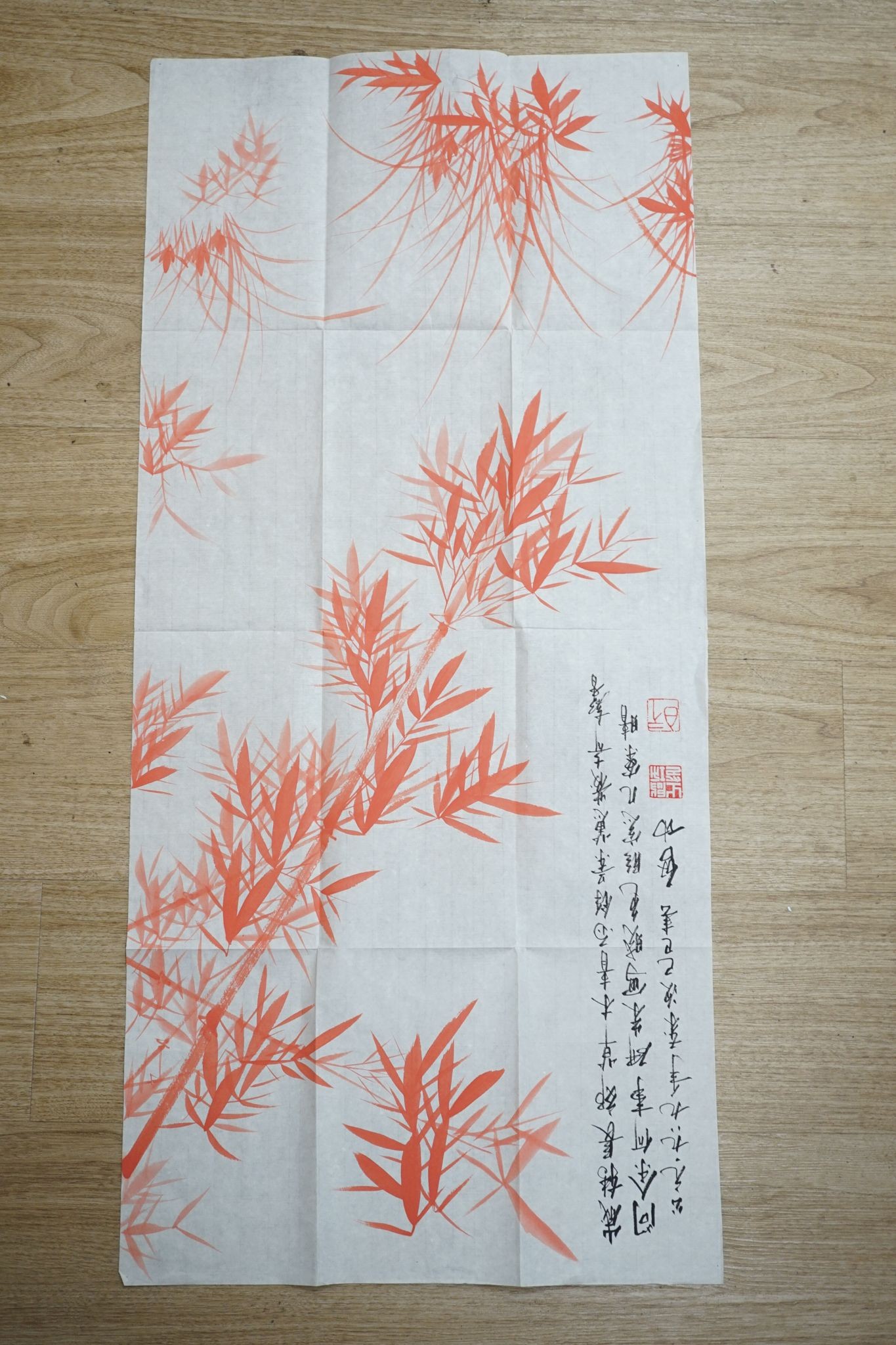 Two Chinese floral watercolour paintings, and a script proverb, 100 x 50cm.